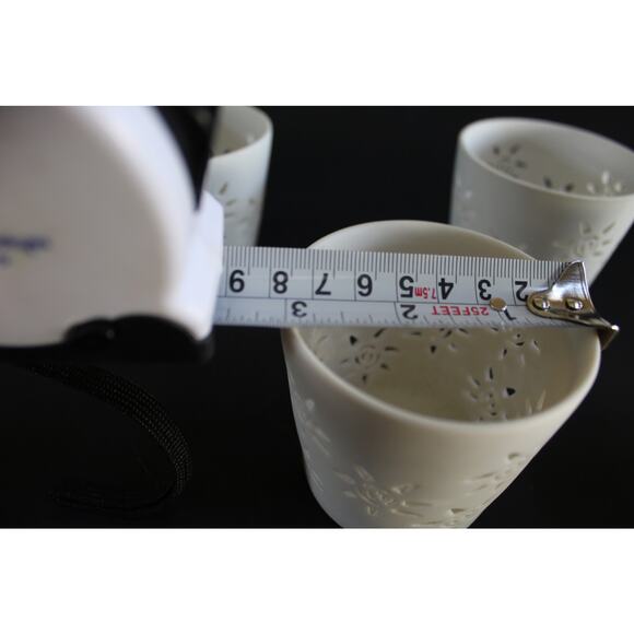 Set of 4 White Ceramic Tealight Holders with Sunflower Cutout Design - Picture 7 of 10